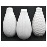 THREE WHITE CERAMIC VASES