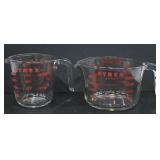 TWO PYREX MEASURING CUPS
