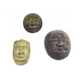 TRIO OF DECORATIVE STONE CARVED AFRICAN MASKS