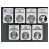 (7) SILVER EAGLES NGC 69