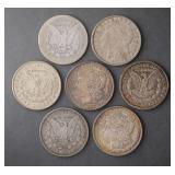 Seven Morgan Silver Dollars