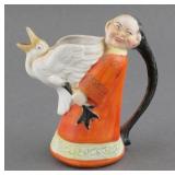 Schafer Vater Asian Man Holding A Goose Creamer