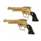 (2) Hubley Texan Jr. Gold Cap Guns & Holsters