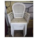 Stack of 6 White Plastic Chairs