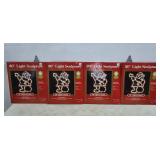 (4) 20" Double Sided Lighted Santas w/ Boxes