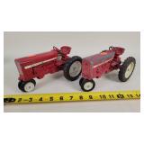 2- Played 1/16 International Tractors