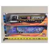 2- 1/64 Hotwheels Team Transporters