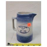 Red Wing Money Creek MN Adv. Pitcher