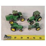 4- Played 1/64 John Deere Tractors