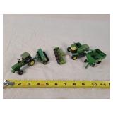 4- Played 1/64 John Deere Farm Toys
