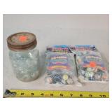 2- Bags of Champion & 1 Jar of Marbles