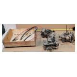 Two holley and one lower jet carburetor