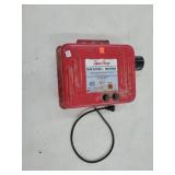 Dyna-Charge electric fence charger.