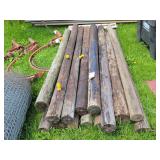 14- Used 7ft Wooden Fence Posts