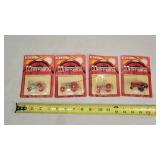 Set of 4 1/64 IH Historical Tractors