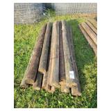 13- Treated Wooden Fence Posts 7-8ft. Long