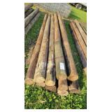 11- Treated Wooden Fence Posts 12 Ft. Long