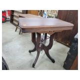 Antique Ornate Walnut Table W/ Castors