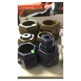 GROUP OF BROWN & BLUE PLANTERS & CANDLESTICKS