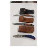 3 DAMASCUS STYLE POCKET KNIVES W/ CASES