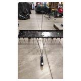 PULL BEHIND YARD THATCHER