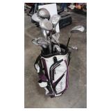 DUNLOP AND RANDOM GOLF CLUBS IN BAG