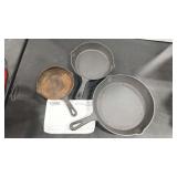 3 CONTEMPORARY CAST IRON SKILLETS