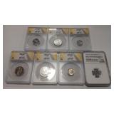 7- GRADED FOREIGN COINS ASSORTMENT