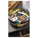 CAN OF COSTUME JEWELRY