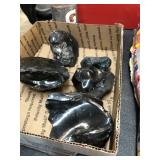 GROUP OF BLACK ROCKS