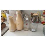 4 MILK BOTTLES