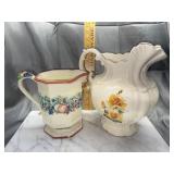 2 floral pitchers