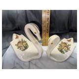 Out of vintage ceramic swans