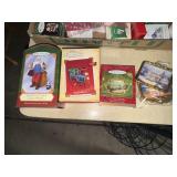 3 hallmark ornaments and 3 Thomas Kincaid