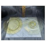 2 yellow depression platters