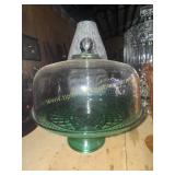Green cake stand with clear dome