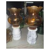 Marble candle lanterns with amber globes