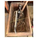 Hook pulley and rope in wooden crate