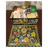 Matchbooks in vintage embossed floral tin