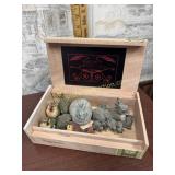Cigar box of rabbit and bird figures