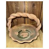Pottery basket with braided handle