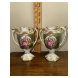 Pair of small Victorian style urns courting