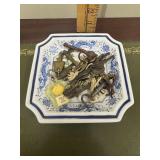 Old keys in blue and white dish