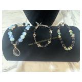 3 hand strung glass bead bracelets black and