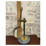 Vintage brass desk top magnifying glass with