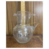 Etched blown glass pitcher