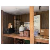 Miscellaneous items on top shop shelf