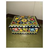 Vintage embossed tin full of old steel ball