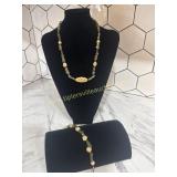 Beautiful artisan carved bead and green stone