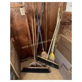 Group of shop brooms